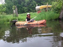 Danielle Watts prepares to paddle back in time at Great Marsh