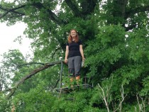 Danielle Watts surveys Great Marsh, PA from a treestand